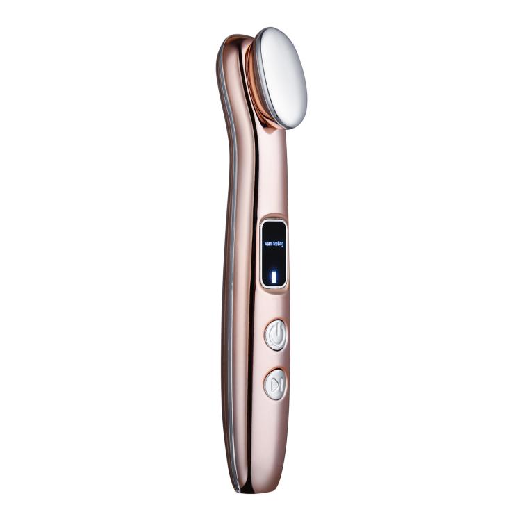 Rose gold hot compress eye massager with oval heating head and control panel.