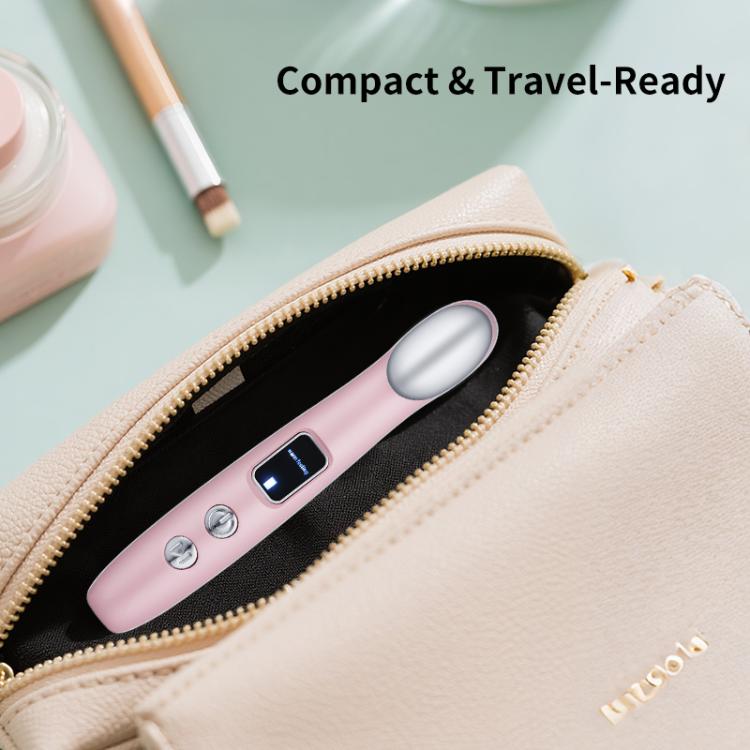 Pink hot compress eye massager with glowing control buttons in a zip pouch