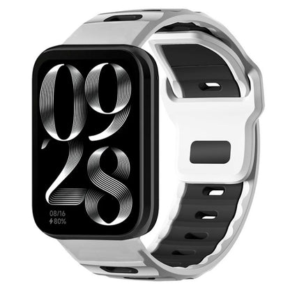 White and black two-tone silicone watch band shown on a smartwatch