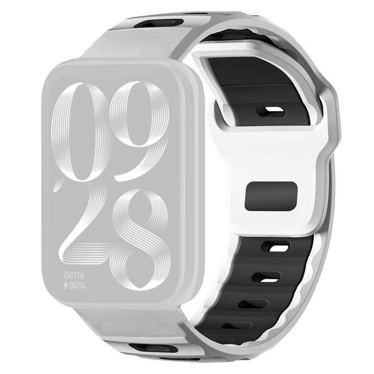 White and black silicone watch band shown on a smartwatch with a pale display