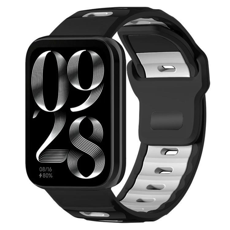 Black and white two-tone silicone watch band on a smartwatch