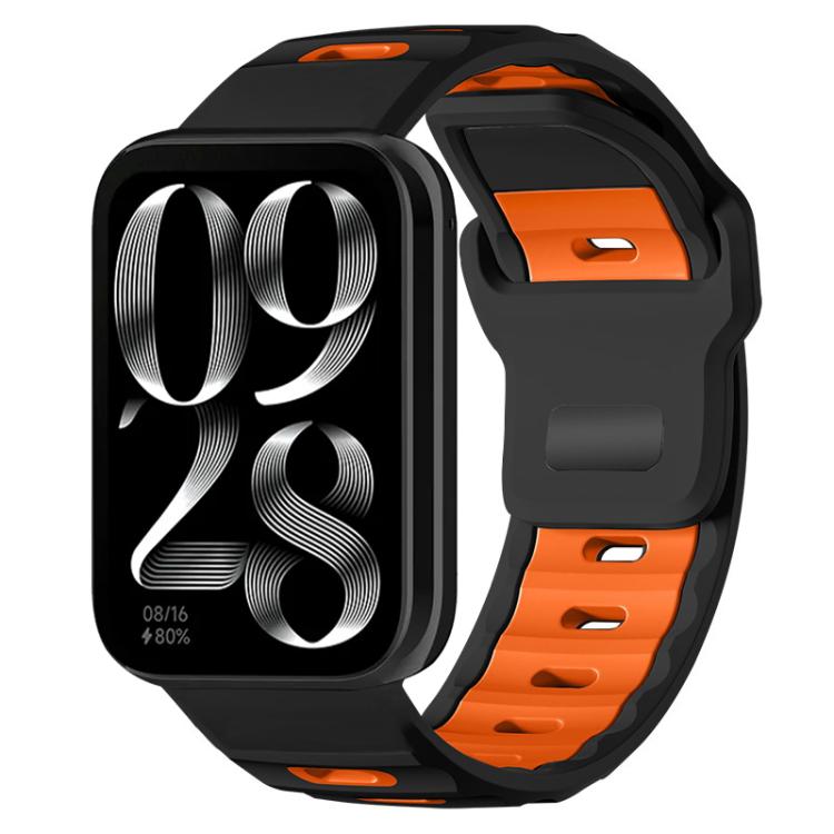 Black and orange two-tone silicone watch band on a smartwatch