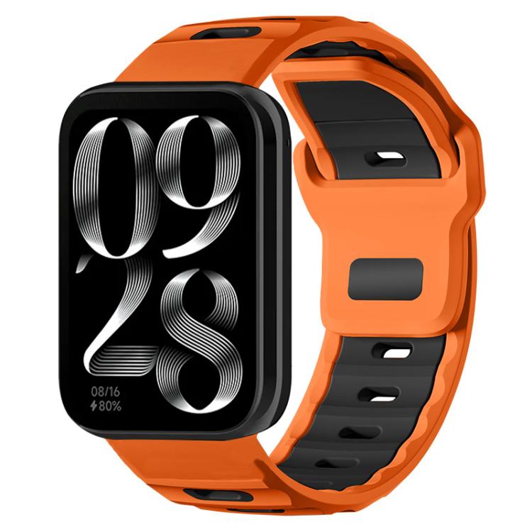 Dual-color silicone watch band, orange with black accents, shown on a smartwatch