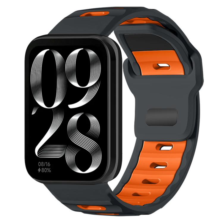 Dual-color silicone watch band, charcoal with orange accents, shown on a smartwatch