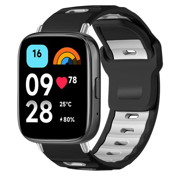 Dual-color silicone watch band, black with white accents, shown on a smartwatch