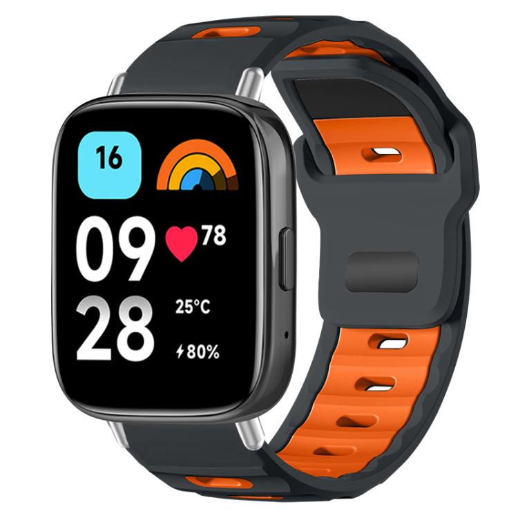 Charcoal and orange silicone watch band with a perforated adjustable strap