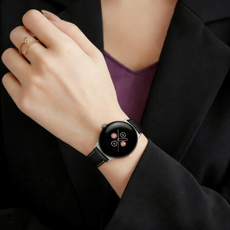 Black vegan leather watch band with rose gold buckle on a round smartwatch