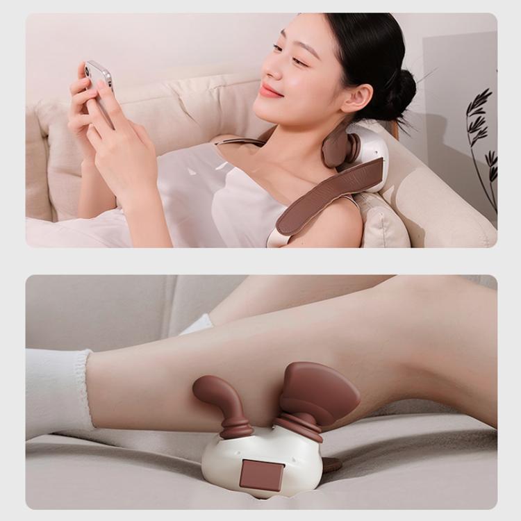 Neck and shoulder massager worn on the neck while relaxing on a couch