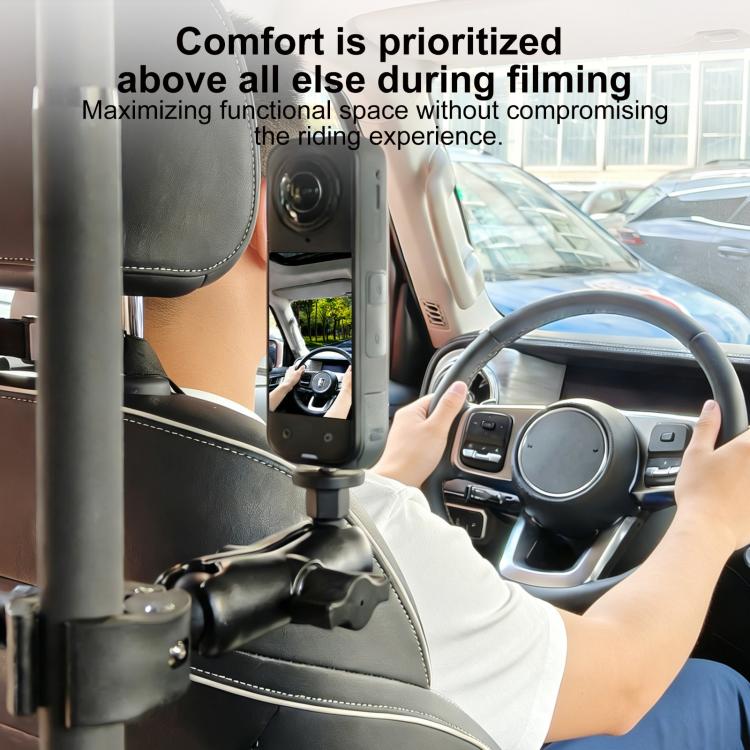 In-car camera mount pole holding a small dash-mounted camera beside steering wheel