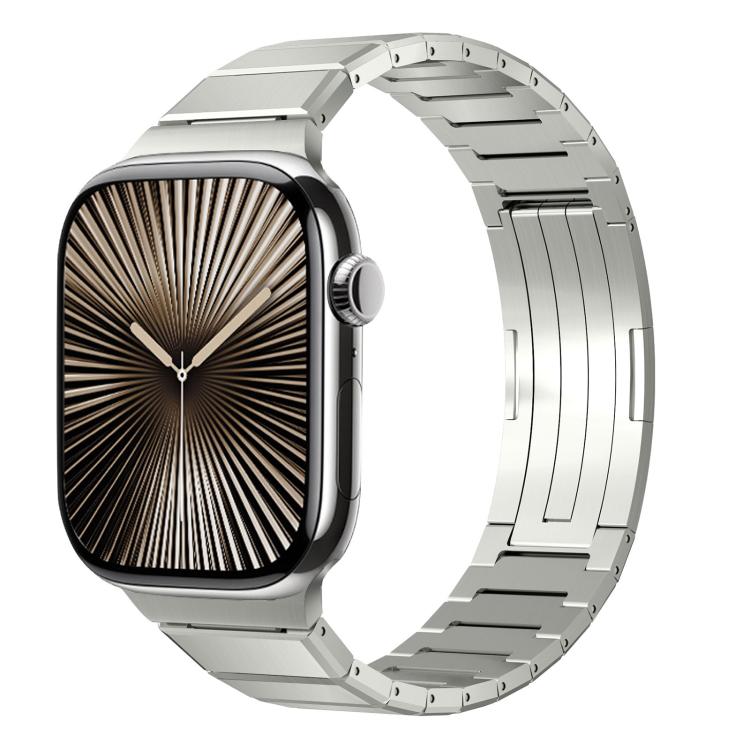Silver-tone metal Apple Watch band with linked bracelet and folding clasp, shown from the front.