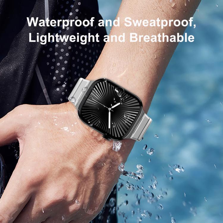 Silver metal watch band worn while splashing through water.