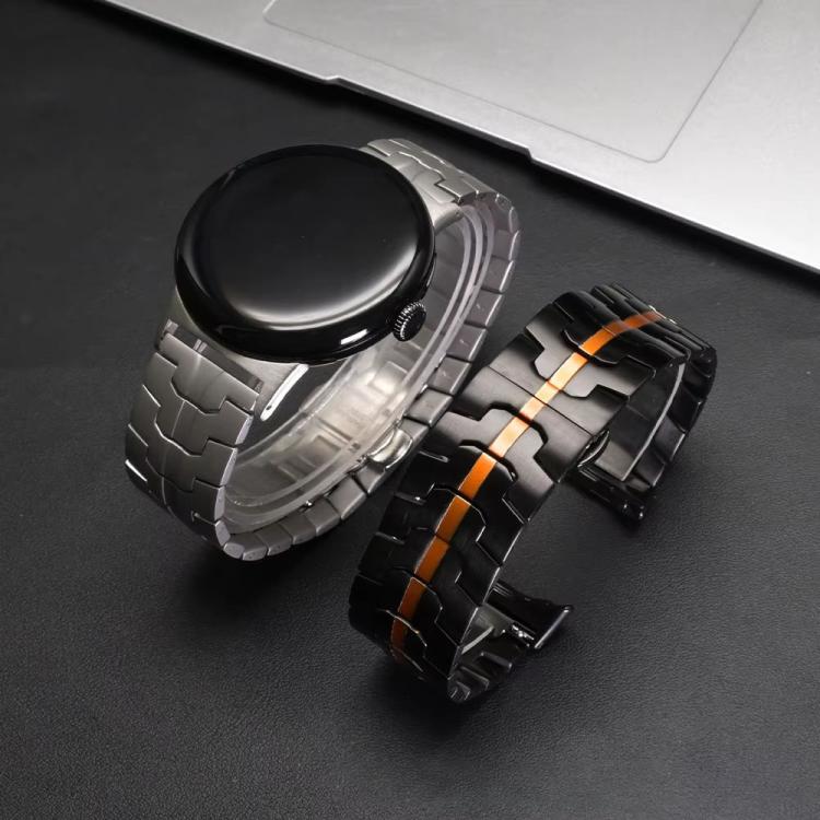 Black and orange stainless steel watch band beside a watch with silver band