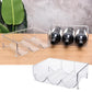 Clear PET bottle organizer rack with three black wine bottles and curved holders