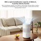 White no-mist humidifier on a table with vented top and front indicator bar