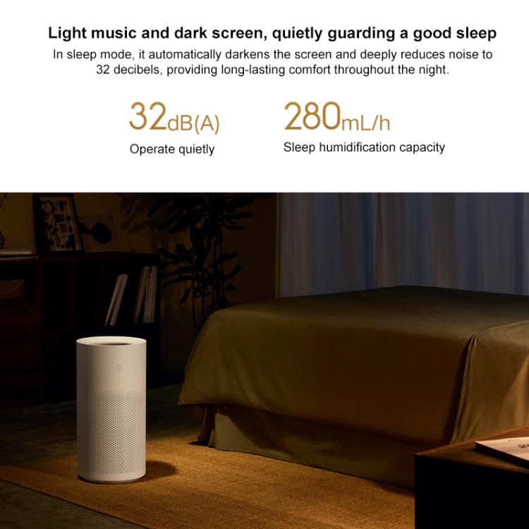 White no-mist humidifier with circular control area, lit at night on floor