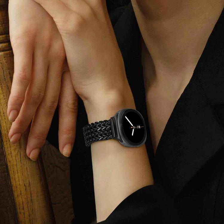Black braided stainless steel watch band worn on the wrist