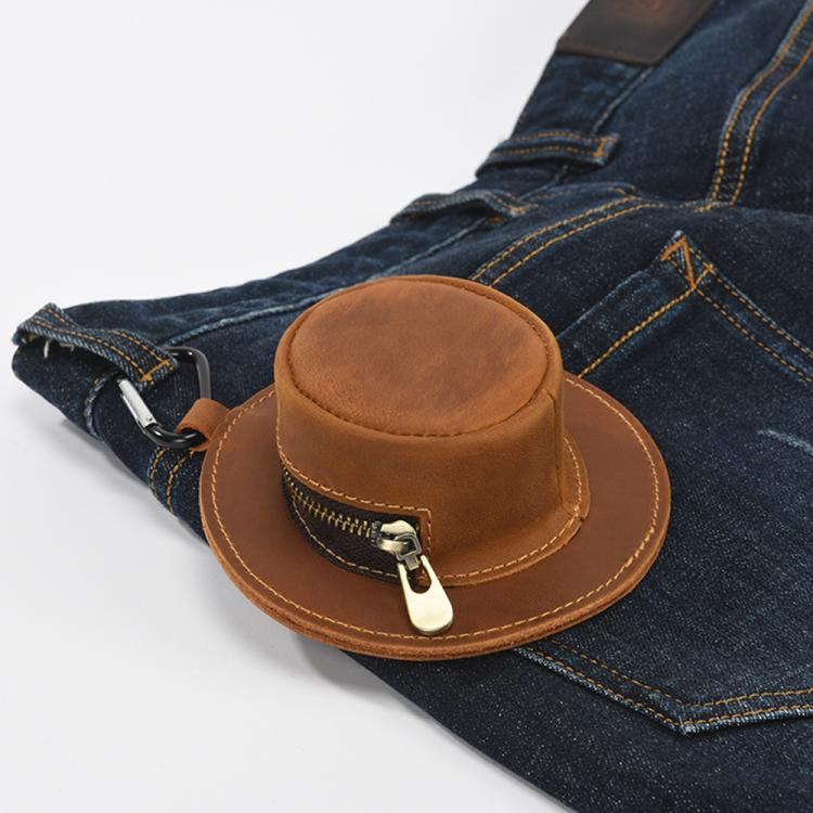 Brown leather hat-shaped coin purse clipped to jeans waistband with carabiner