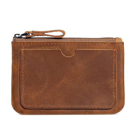 Brown leather coin purse wallet with zipper and wrist strap, front panel and stitching
