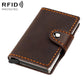 Dark brown genuine leather RFID card holder with snap button strap and orange stitching