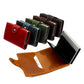 Stack of colorful leather RFID card holders with snap button and pop-up aluminum tray