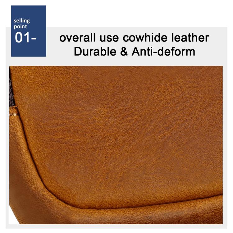 Shell-shaped leather coin purse close-up, tan grain texture and stitched edge