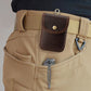 Genuine leather small waist bag with front snap pocket worn on a belt