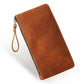 Brown leather large clutch wallet with wrist strap and top metal zipper
