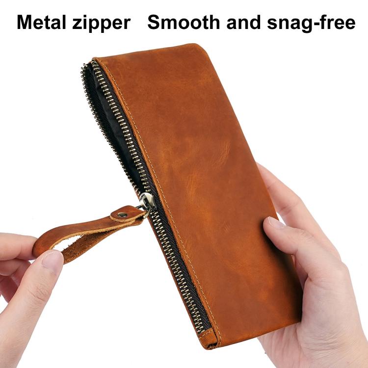 Vintage leather phone wallet clutch, brown, metal zipper, wrist strap, side angle view