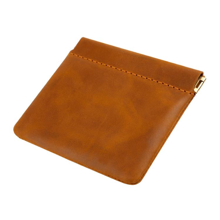 Brown leather coin purse with top zipper and contrast orange stitch trim