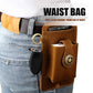 Brown leather waist bag on denim belt with key fob, phone slot, and star emblem patch