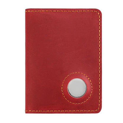Vintage leather passport card holder in red with circular tracker slot and stitched edges