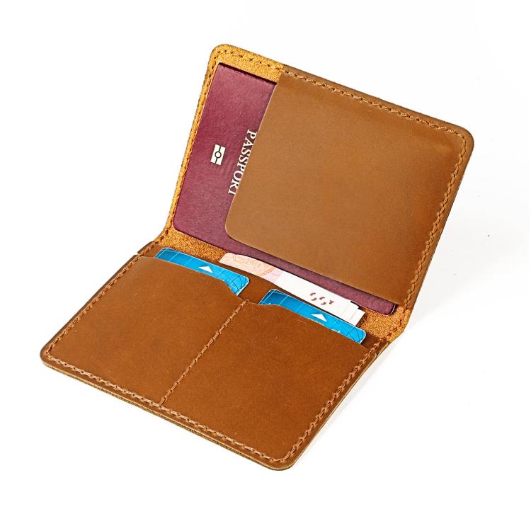 Fold-open leather passport card holder with card slots and stitched compartments