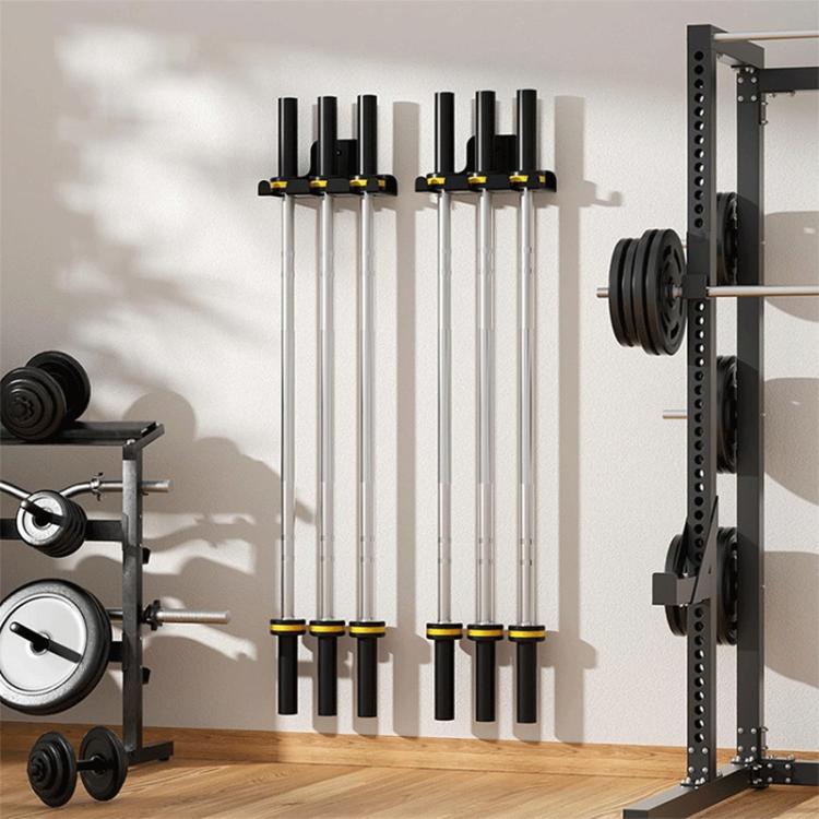 Wall-mounted barbell storage rack holding several bars in a vertical row