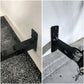 Black bicycle wall-mounted bracket installed with clamp arm holding the bicycle