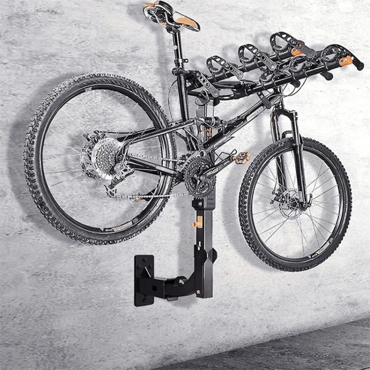 Black bicycle storage wall bracket securing a bicycle frame near the wall
