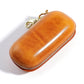 Tan leather sunglasses storage box with gold zipper and keychain clip