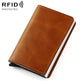 Brown RFID card holder wallet with stitched leather cover and snap closure