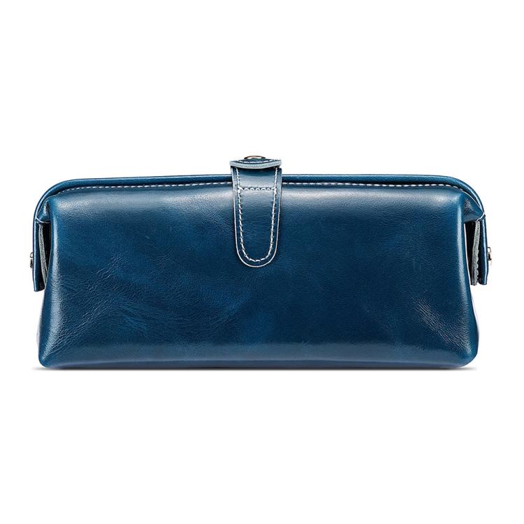 Blue leather toiletry bag with top zipper, loop handle, and side tassel pulls