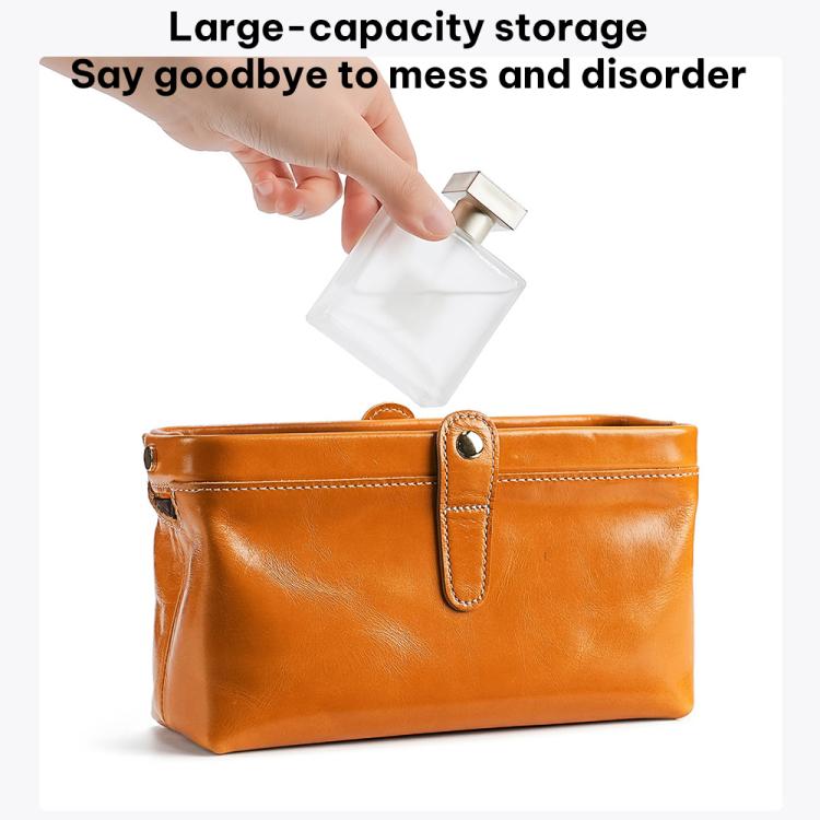 Oil-waxed leather toiletry bag tan/orange with front strap and open top storage