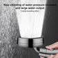 Pressurized shower head spraying a strong continuous water stream, dark gray