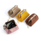 Assorted small clip coin purses with kiss-lock frames and bead chains in multiple colors