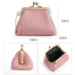 Pink coin purse with kiss-lock clasp frame and chain loop