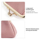 Pink textured coin purse with gold-tone clasp hardware and strong stitching
