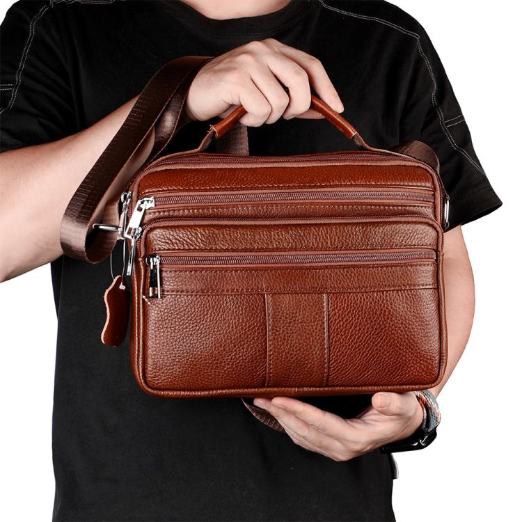 Brown top-grain cowhide crossbody handbag with front zipper pocket and adjustable strap