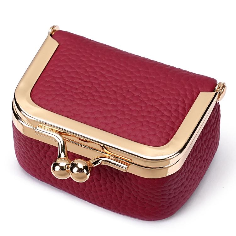Wine red mini jewelry storage bag with gold-tone clasp and hinged frame.