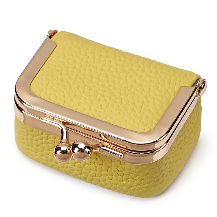 Pale yellow mini jewelry storage bag with gold-tone clasp and hinged frame.