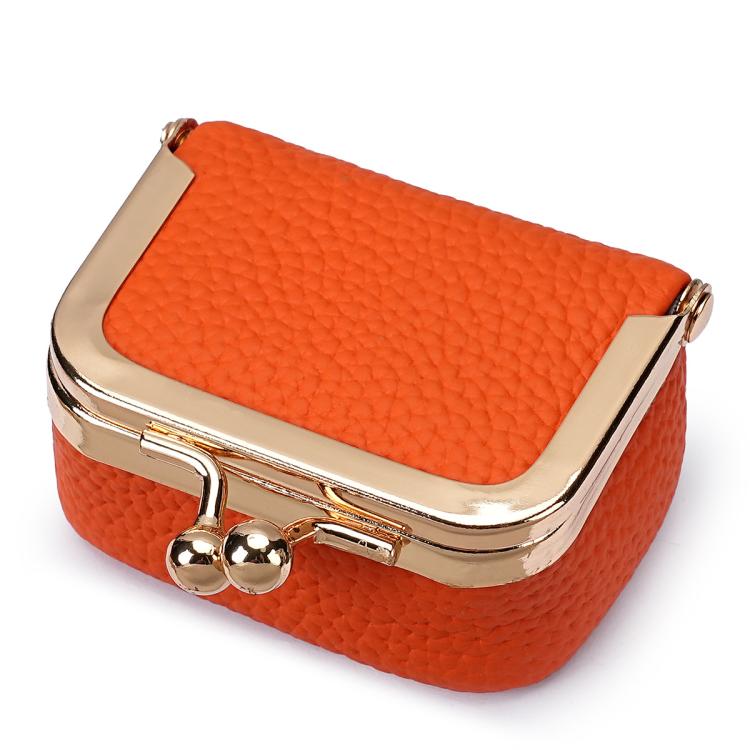 Orange quilted mini jewelry bag with gold-tone frame and front clasp