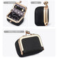 Black mini jewelry bag showing interior and side view with gold-tone hardware