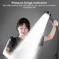 Handheld shower head spraying a strong water stream, dark gray handle