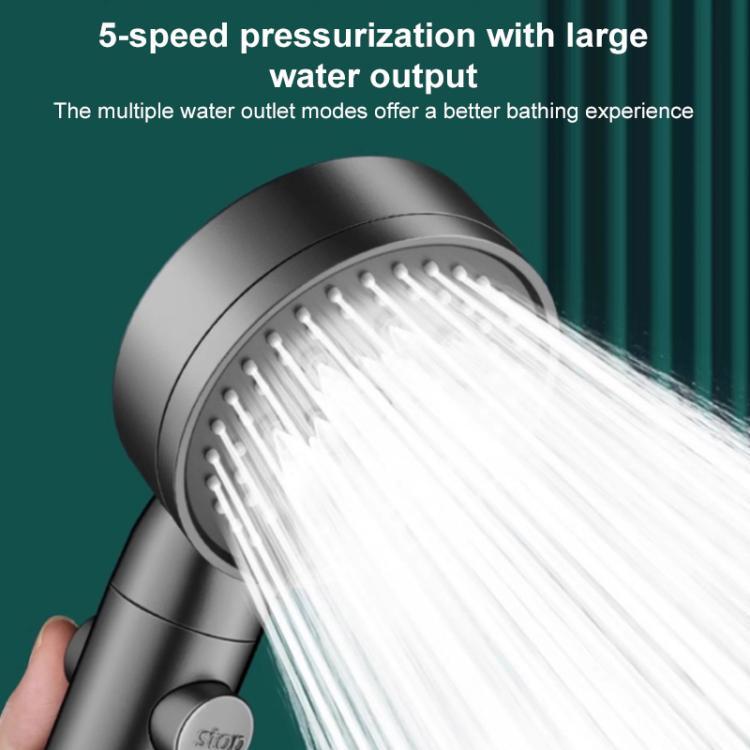 Handheld shower head spraying high-pressure water from multiple outlets, dark gray